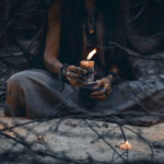Person-holding-candle-1200x853-1